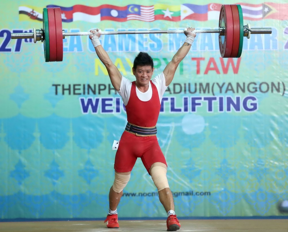 Weightlifter Thach Kim Tuan breaks two SEA Games' records. (Photo:SGGP)